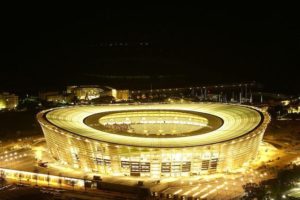 Soccer stadium at night with lights on