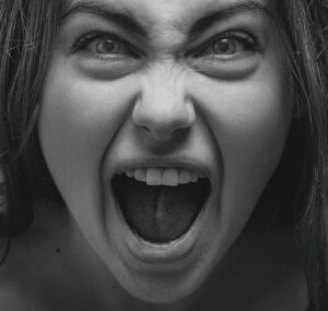 Close up of woman screaming angrily